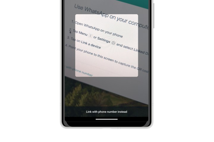 WhatsApp on Android showing option to link with a phone number instead of a QR code.