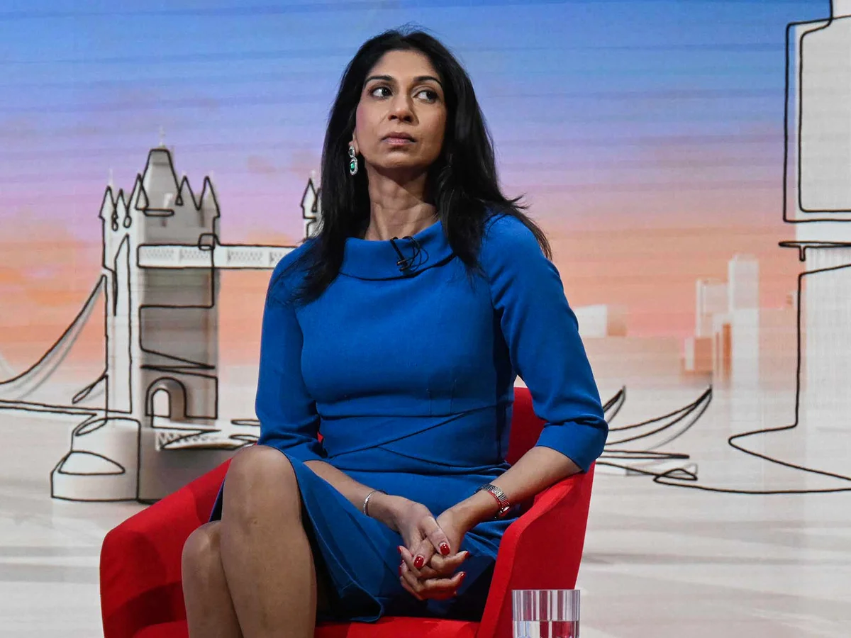 Suella Braverman looking serious while speaking on the BBC Politics set.